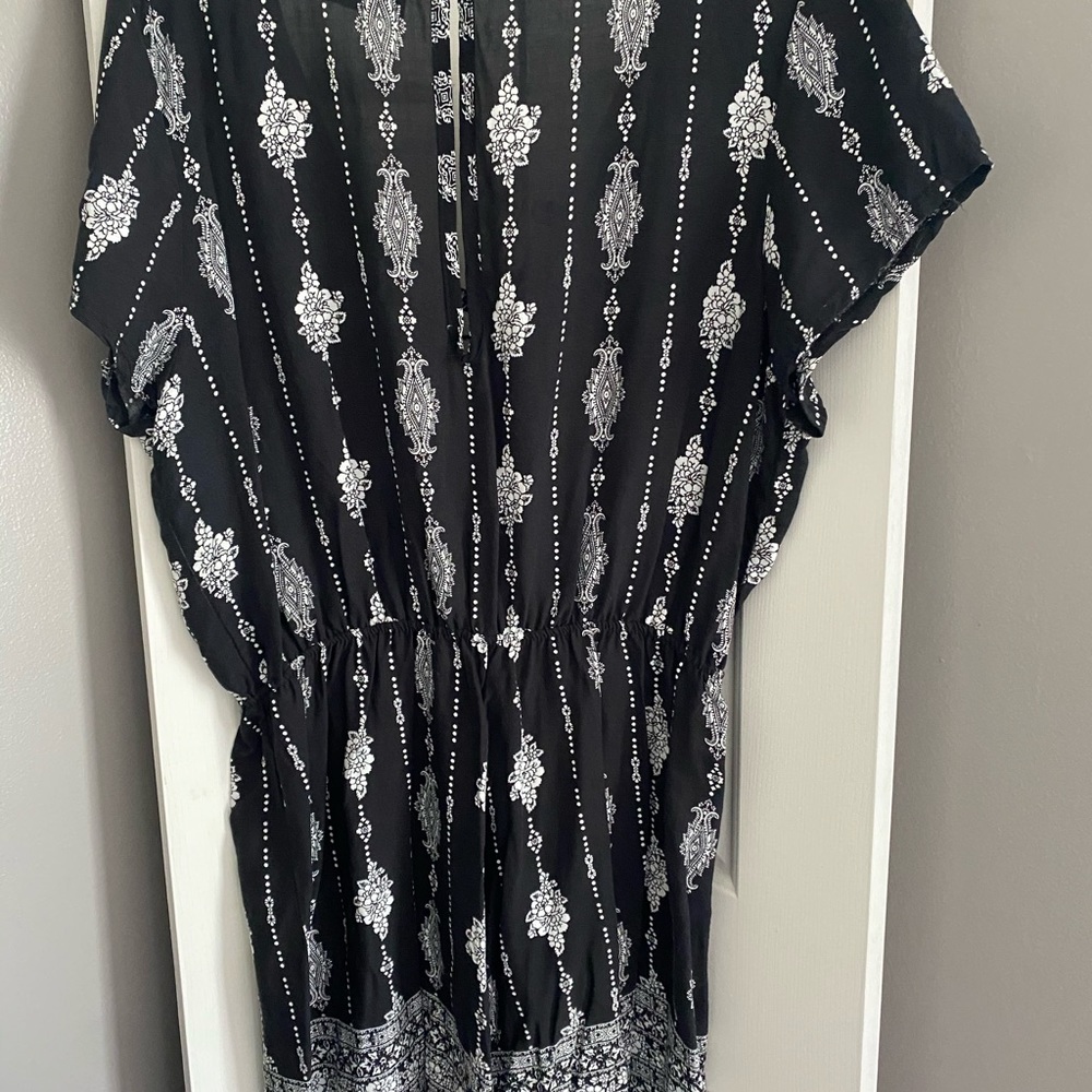 Short-sleeved romper.